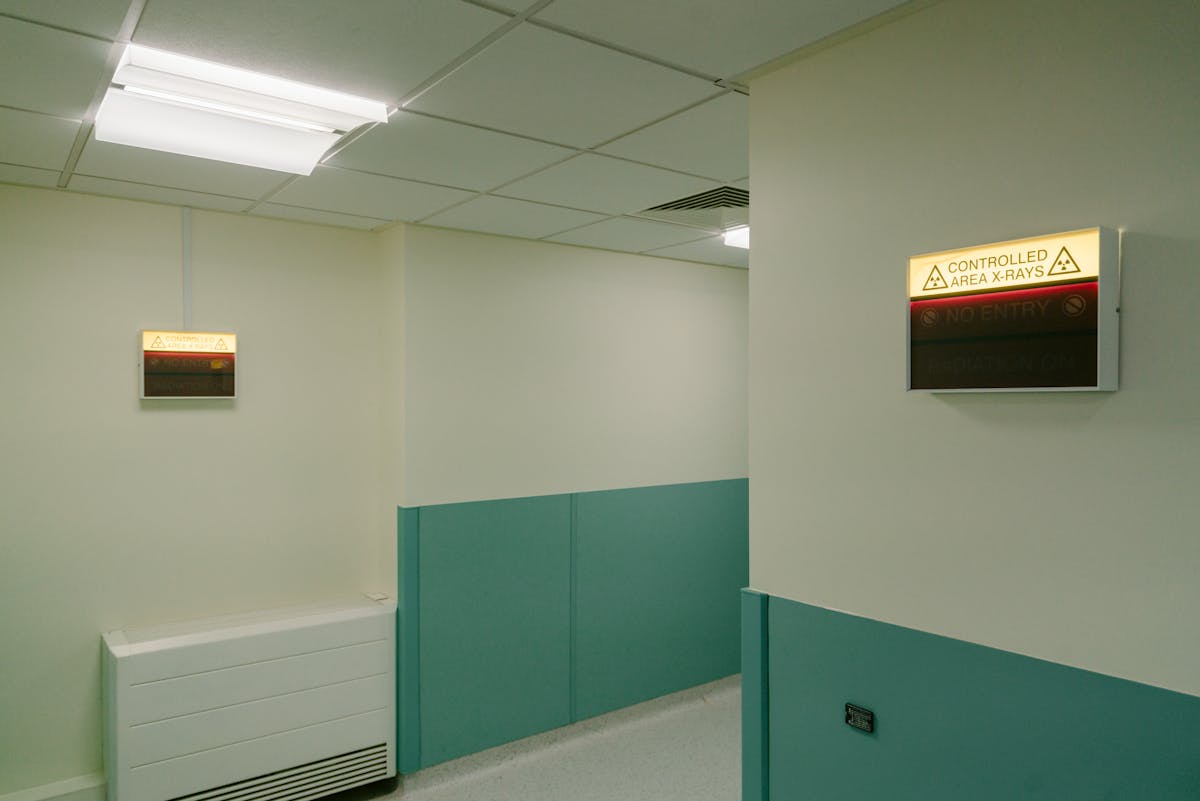 Healthcare hallway with sensitive spaces for commercial pest management